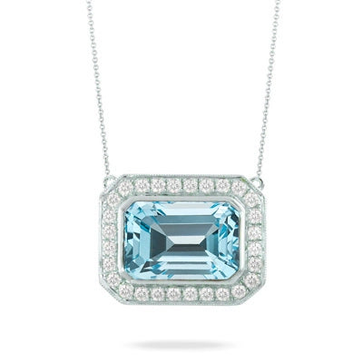 Best necklaces and pendants with emerald gemstones for a rich, sophisticated design-Doves 18K White Gold Sky Blue Topaz Pendant Necklace with Diamond Halo