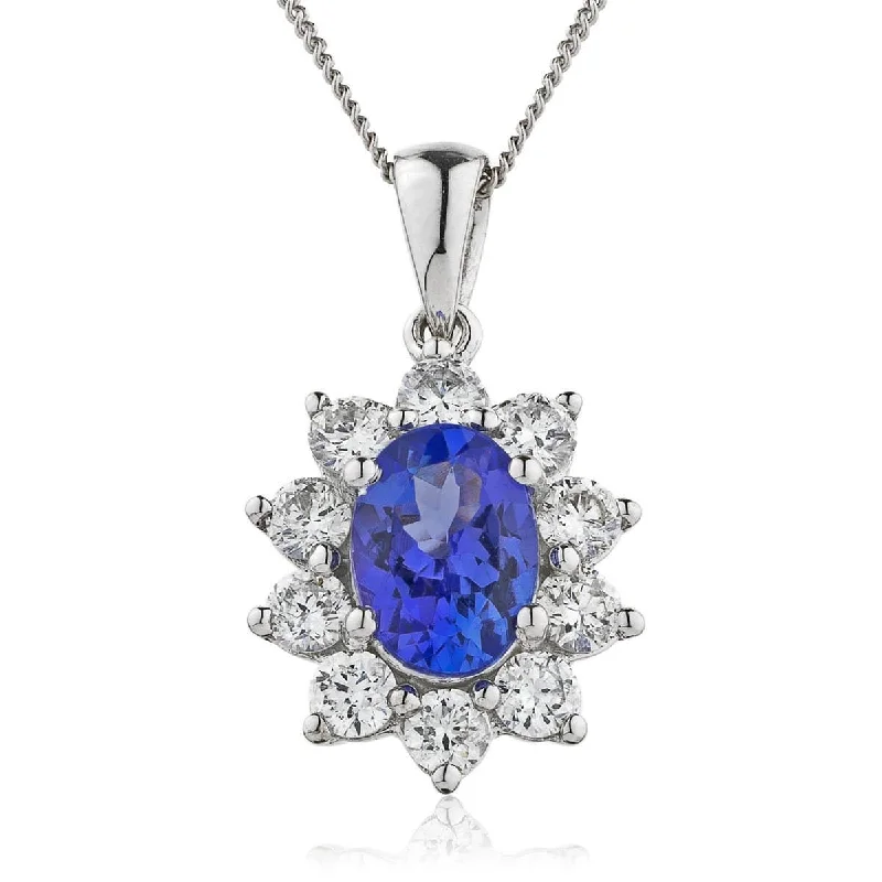 Best necklaces and pendants with silver chains for a sleek, timeless look-Oval Sapphire with Diamond Halo Pendant