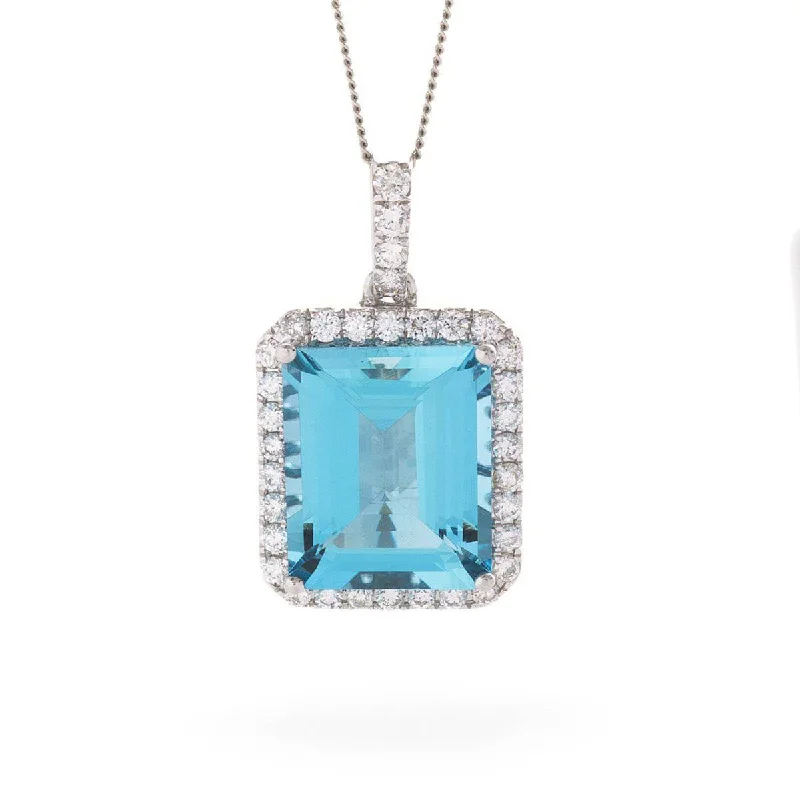 Necklaces and pendants with celestial starburst designs for a radiant look-Emerald Cut Aquamarine Diamond Halo Pendant