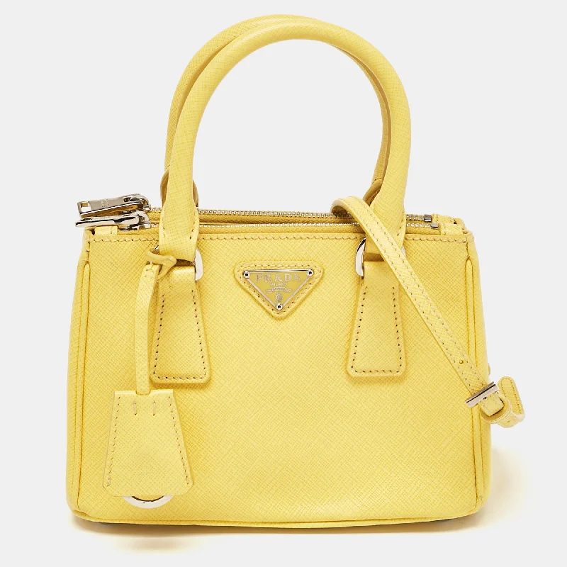 Handle bags with minimalist sleek silhouettes -Prada Yellow Saffiano Lux Leather Mini Double Zip Tote