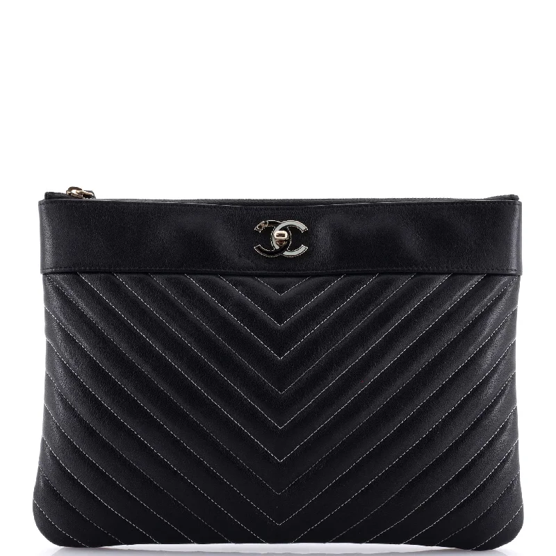 Handle bags with woven fabric for texture -Mademoiselle Vintage O Case Clutch Chevron Sheepskin Medium