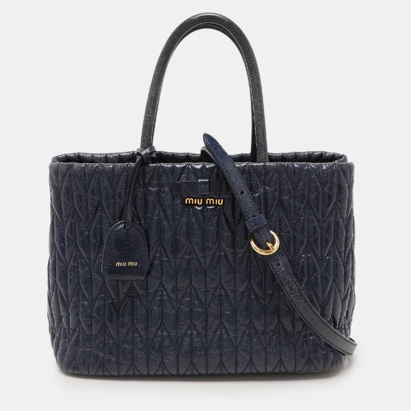 Handle bags with padded interiors for laptops -Miu Miu Blue Matelasse Leather Tote