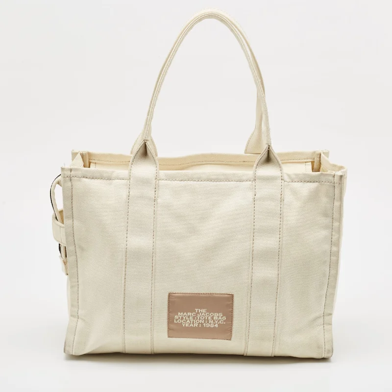 Handle bags with contrast stitching for detail -Marc Jacobs Cream Canvas Large The Tote Bag