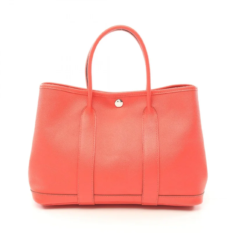 Handle bags with neutral tones for versatility -Hermes Garden Party TPM Tote Bag Pink