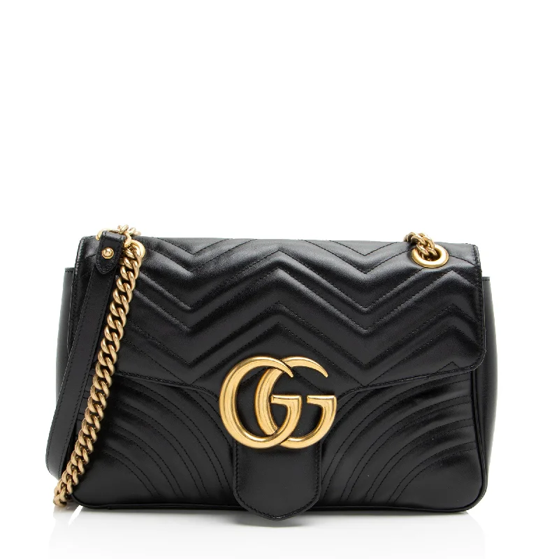 Handle bags with vibrant colors for boldness -Gucci Matelasse Leather GG Marmont Medium Flap Bag