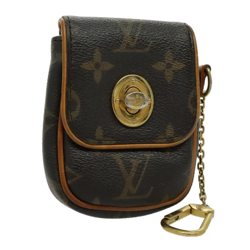 Reversible handle bags offering dual design styles -Louis Vuitton Tulum  Canvas Clutch Bag (Pre-Owned)