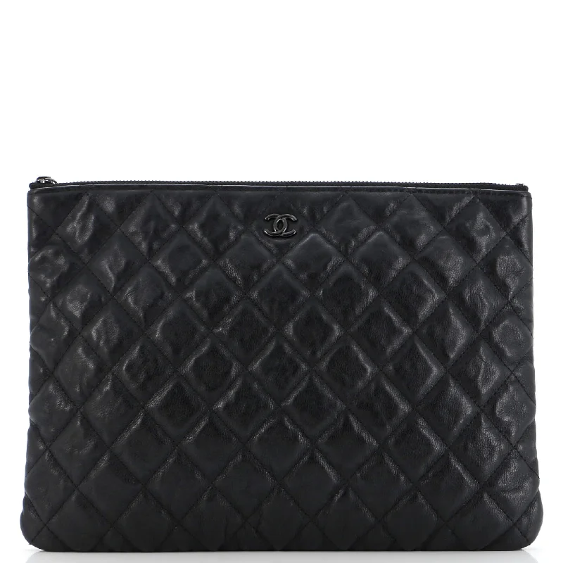 Handle bags with expandable sides for flexibility -O Case Clutch Quilted Crumpled Calfskin Medium