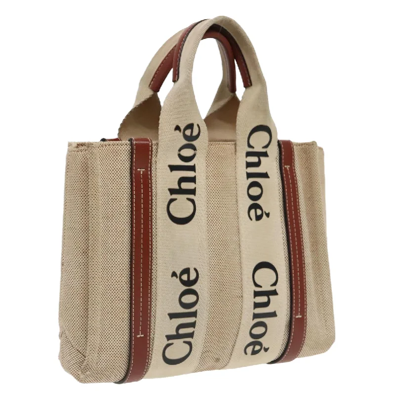 Handle bags with sturdy leather grip accents -Chloé Woody  Canvas Tote Bag (Pre-Owned)