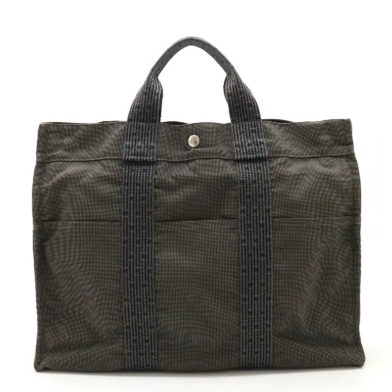 Handle bags with modern logos for branding -Hermes Canvas Herline Tote Bag Black