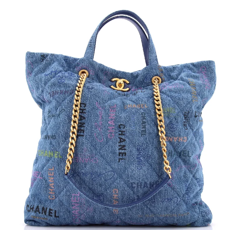 Handle bags with animal prints for flair -Denim Mood Shopping Tote Logo Printed Quilted Denim Maxi