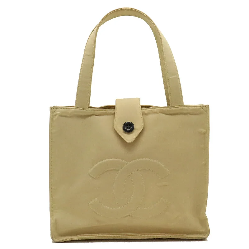 Handle bags with pastel colors for softness -Chanel Nylon Coco Mark Logo Button Tote Bag