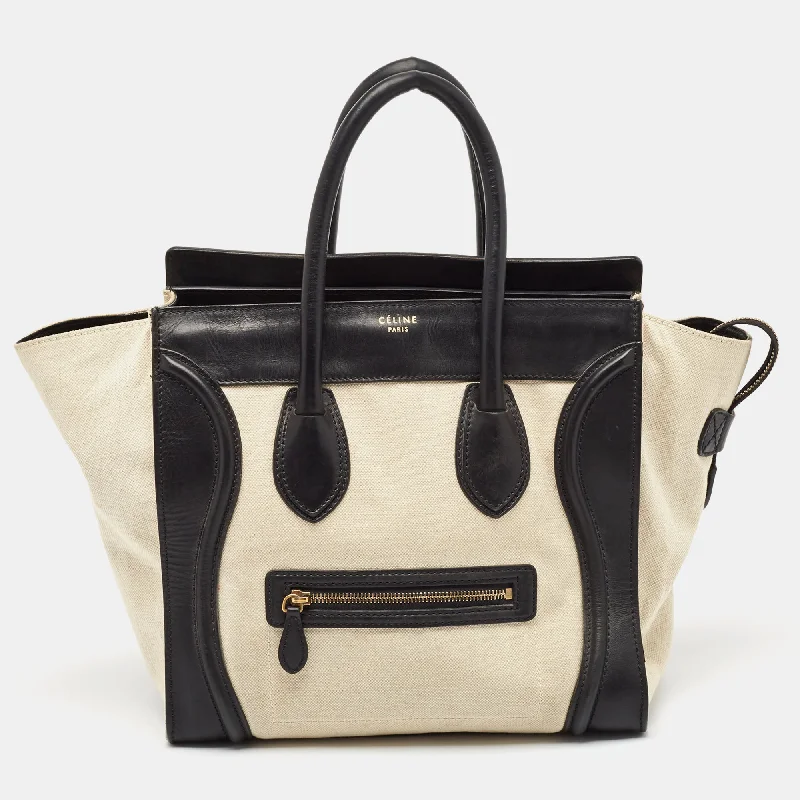 Handle bags with compact designs for portability -Celine Black/off-White Canvas And Leather Mini Luggage Tote