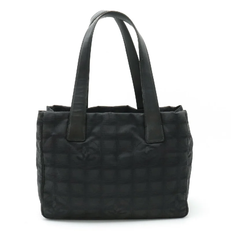 Handle bags with spacious pockets for travel -Chanel Nylon Leather New Travel Line Tote Bag