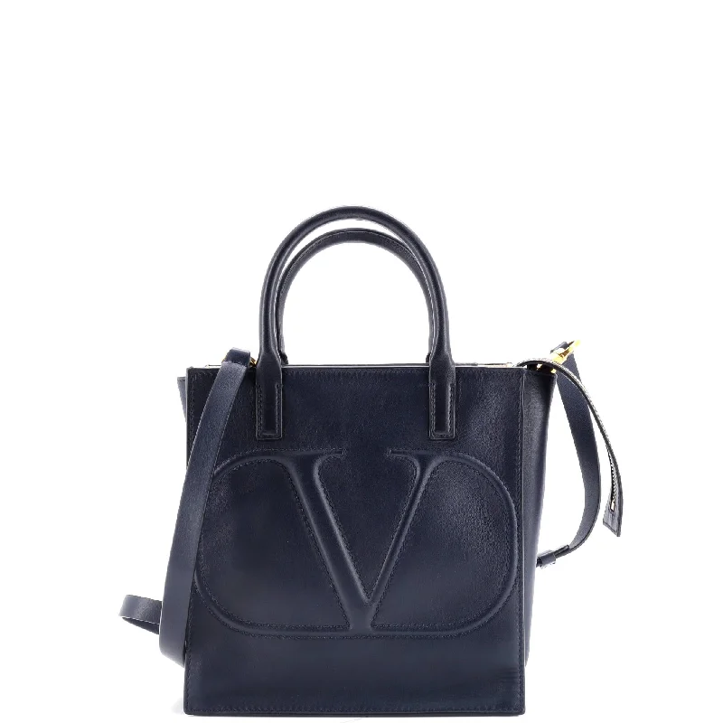 Handle bags with seasonal prints for holidays -VLogo Walk Tote Leather Small