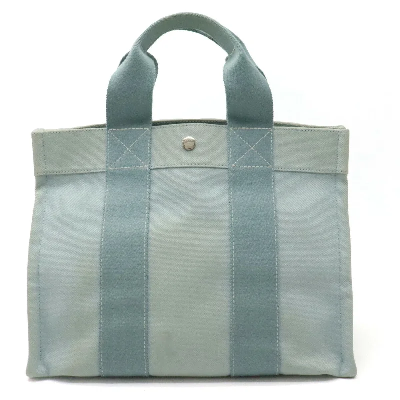 Handle bags with bright neons for visibility -Hermes Bora Bora PM Canvas Tote Bag