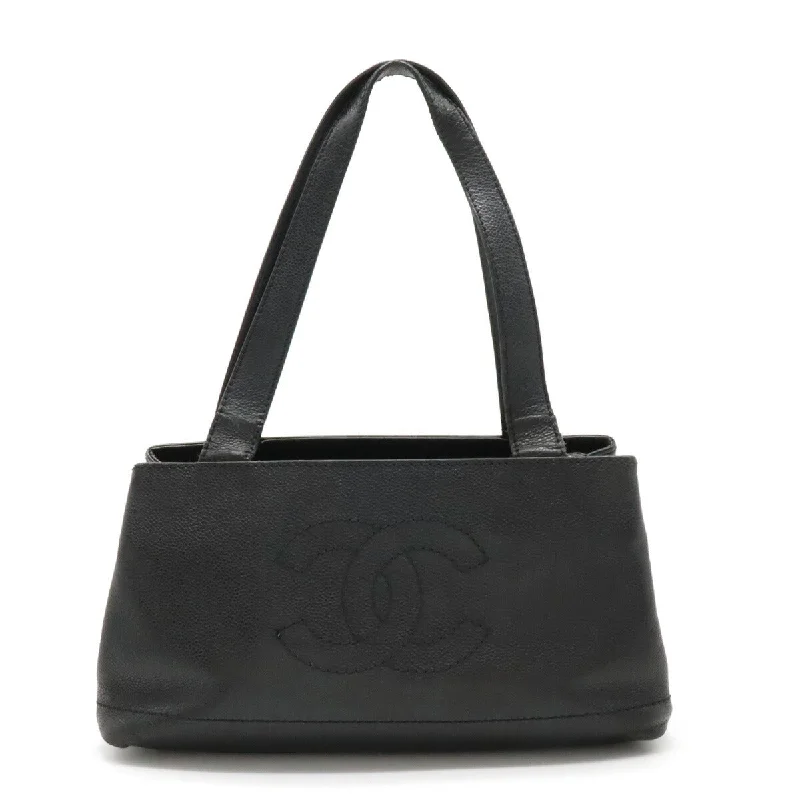 Small handle bags perfect for quick trips -Chanel Caviar Skin Coco Mark Tote Bag